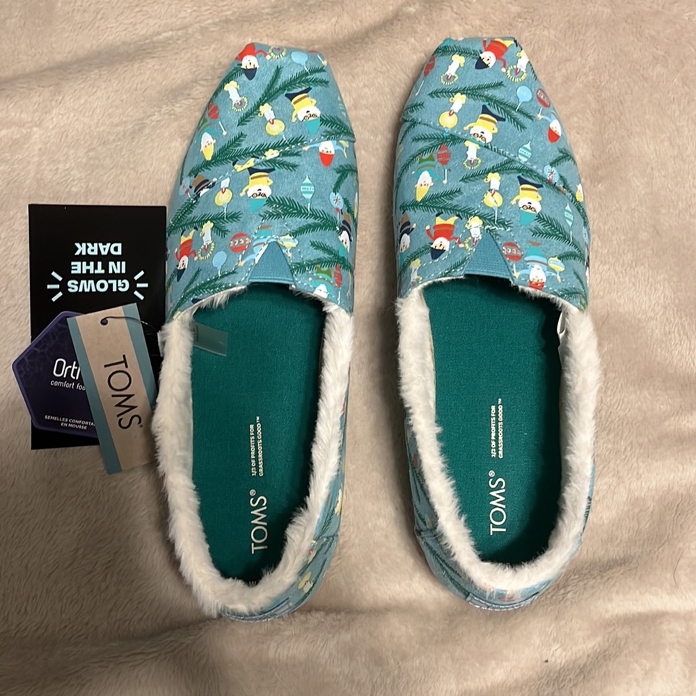 Brand new (in box) pair of Tom’s Alpargata shoes - glow in the dark! Size: 8.5